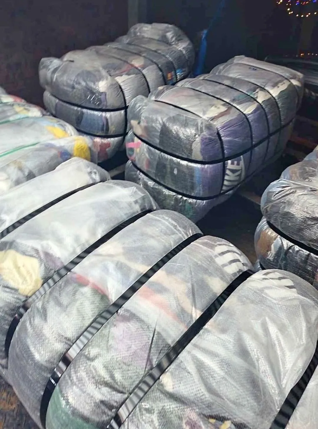 Strapped export bales of second-hand clothing